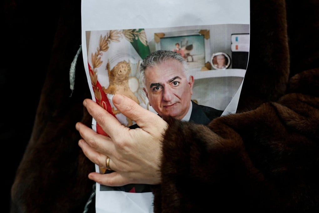 A person holds a picture of Reza Pahlavi at protest in Paris, France, on January 11. Photo: Reuters