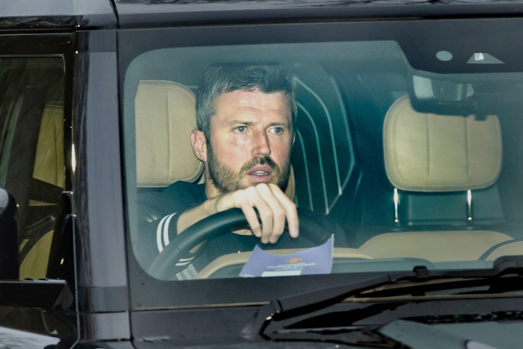 Michael Carrick arrives at Manchester United’s Trafford Training Centre in Carrington, England, on Tuesday. Photo: AP