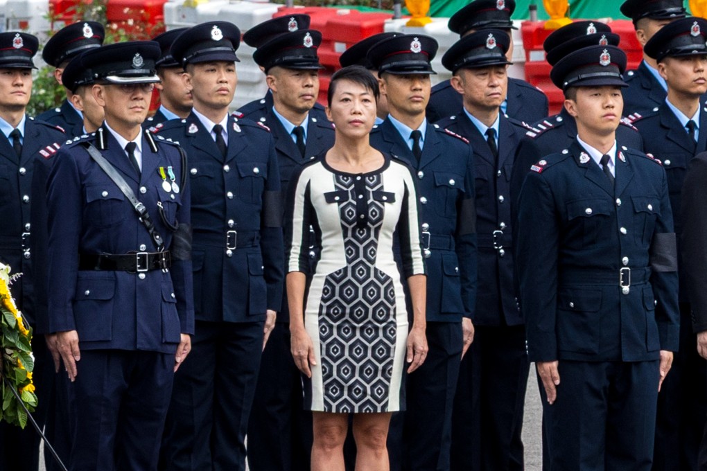 Tai Po district officer Eunice Chan at the funeral of firefighter Ho Wai-ho last month. Photo: Dickson Lee