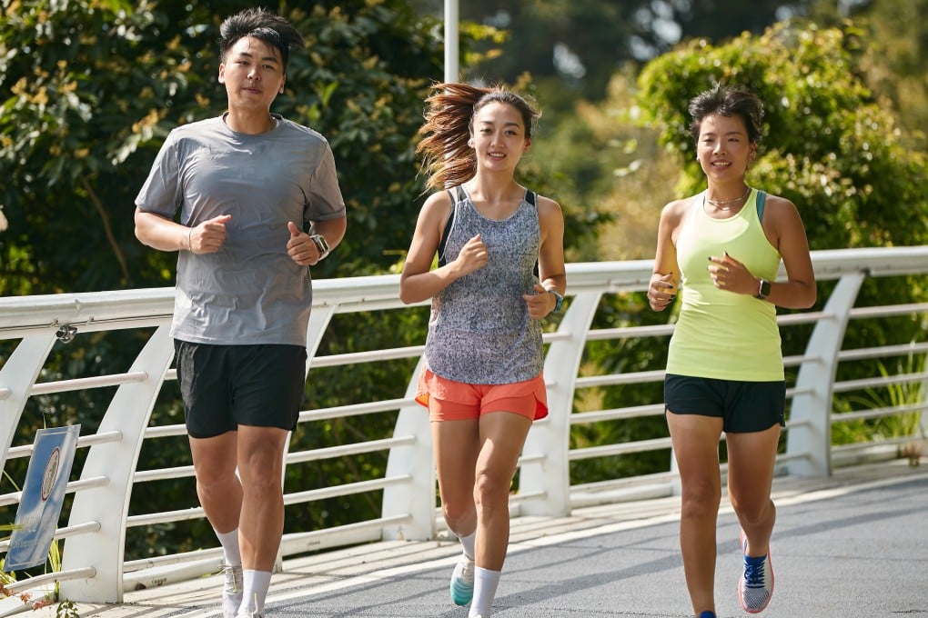 Middle-class workers in China’s big cities are using running to bond with co-workers and clients, with many finding it helps to boost their work performance and health. Photo: Shutterstock
