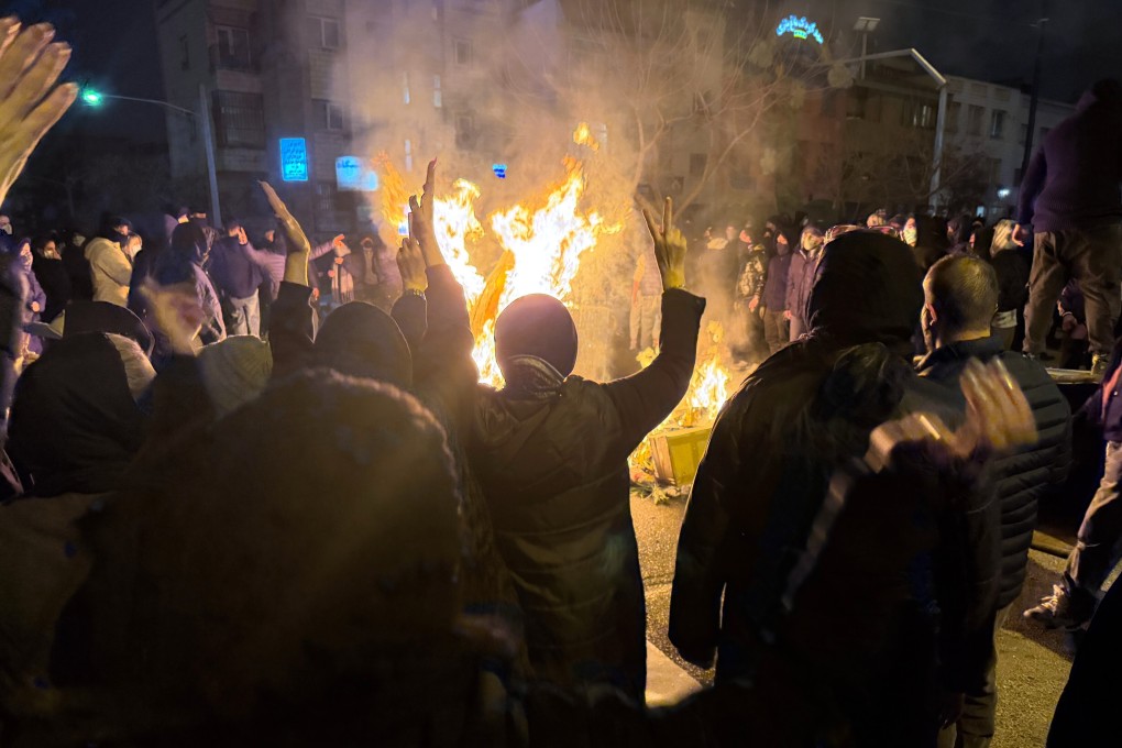 Iranians attend an anti-government protest in Tehran, Iran on January. 9. Photo: AP