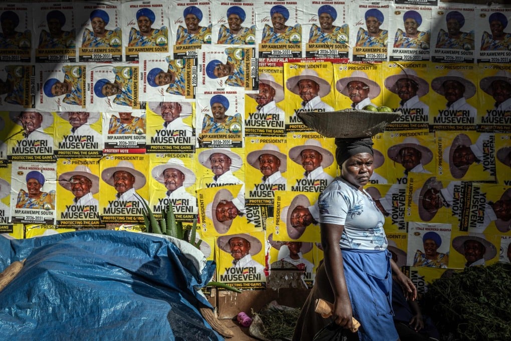 A wall decorated with posters supporting Uganda’s President Yoweri Museveni. Photo: AFP