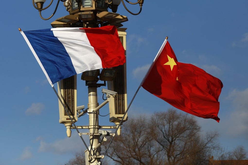 French and Chinese flags are flown in Beijing ahead of a welcome ceremony for French President Emmanuel Macron in January 2018. Photo: EPA-EFE