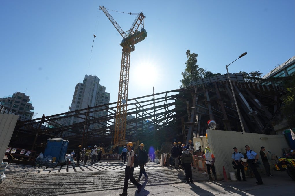 Three gas cylinders fell from a cage hoisted by a crane at a Tsuen Wan construction site on Wednesday, killing a worker and injuring two others. Photo: Jelly Tse