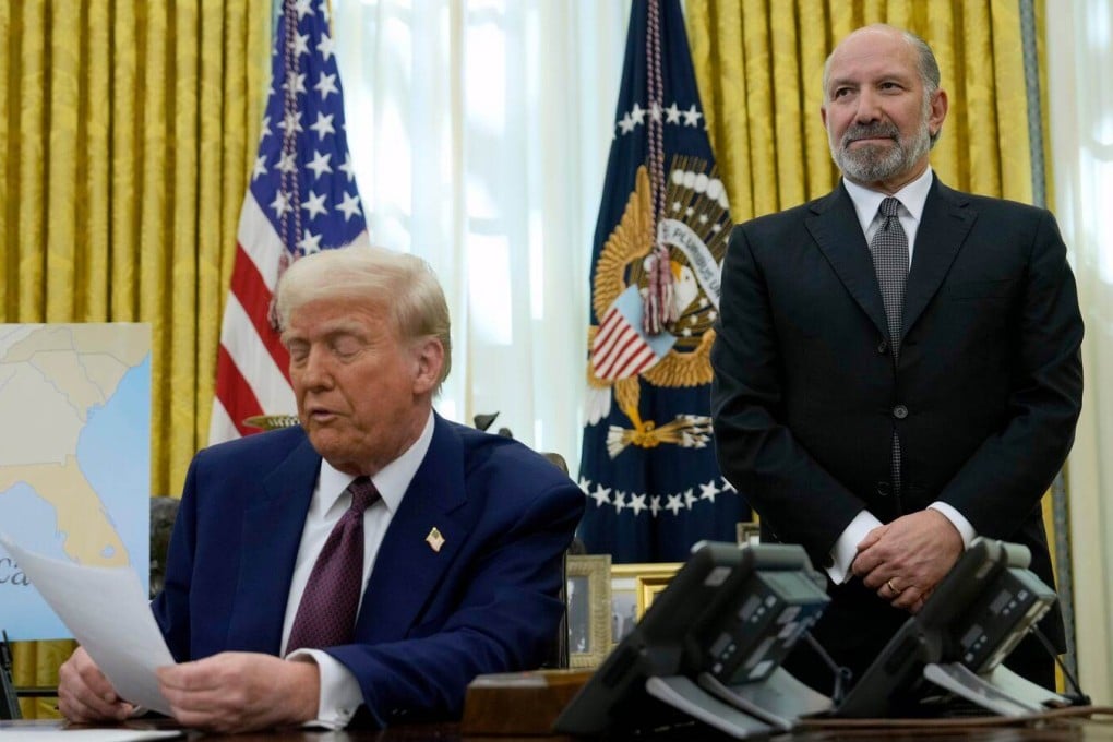 US Commerce Secretary Howard Lutnick (right) and US President Donald Trump are seen last year in the Oval Office of the White House. Photo: AP
