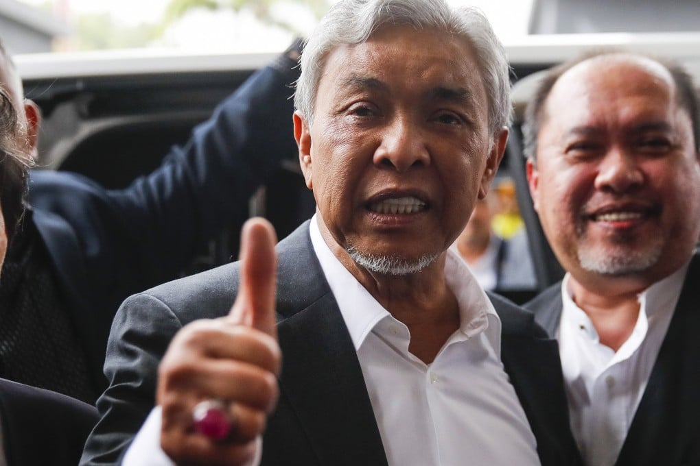 Umno President Ahmad Zahid Hamidi reacts after being acquitted of corruption on September 4, 2023. Photo: EPA-EFE