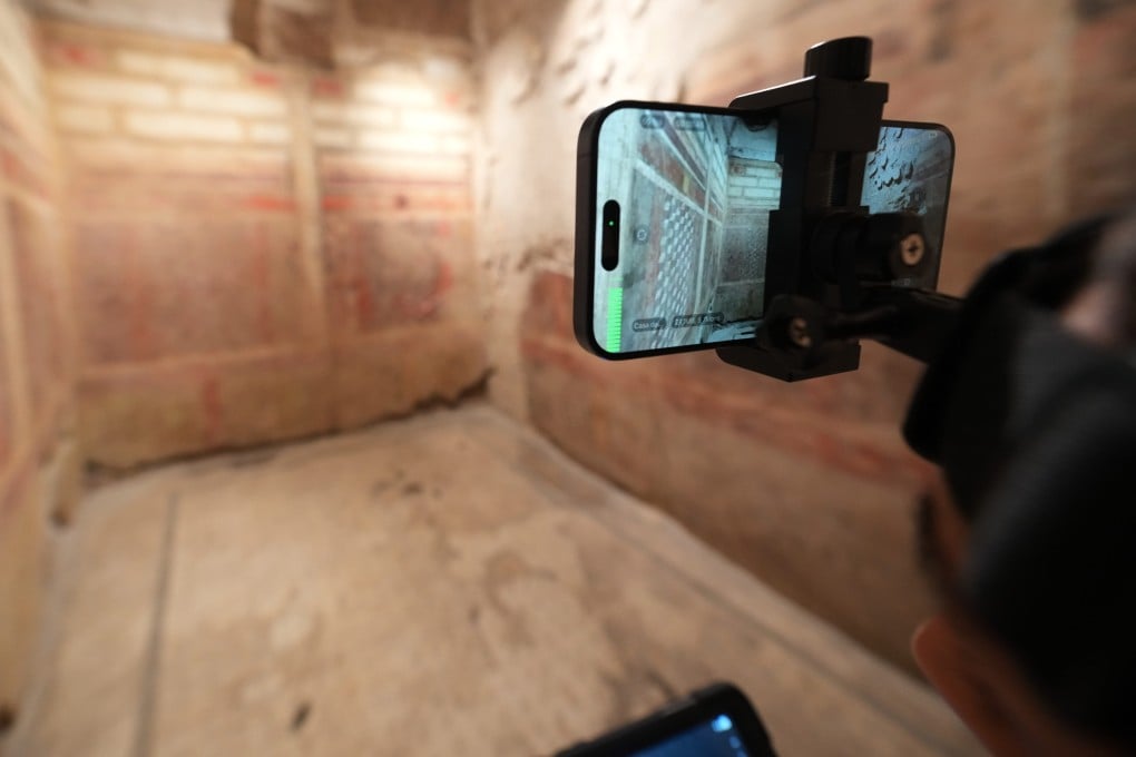 Colosseum Archeological Park guide Valentina uses a head-mounted device to livestream a guided tour of the newly restored underground House of the Griffins, dated between the second and first century BC, on the Palatine Hill next to the Colosseum, in Rome, Italy. Photo: AP