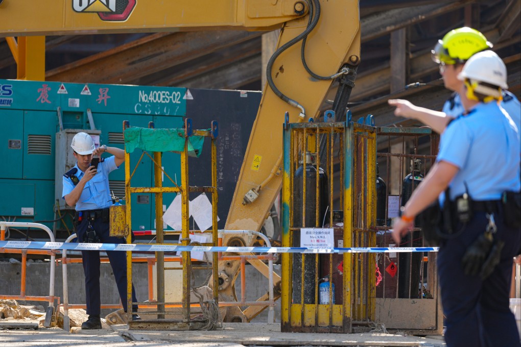 Police investigate a construction site on Po Fung Road in Tsuen Wan on January 14. Three gas cylinders fell from a tower crane at the site, killing one worker and injuring two others. Photo: Jelly Tse