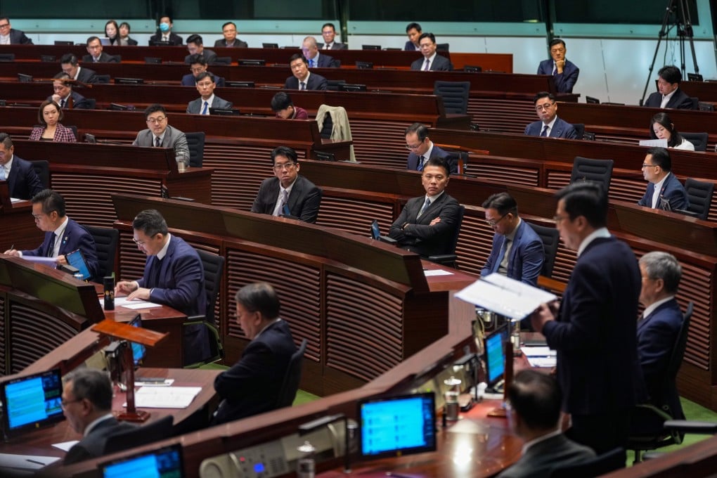 Lawmakers attend the first meeting of the 8th Legislative Council in Admiralty on January 14. Photo: Eugene Lee