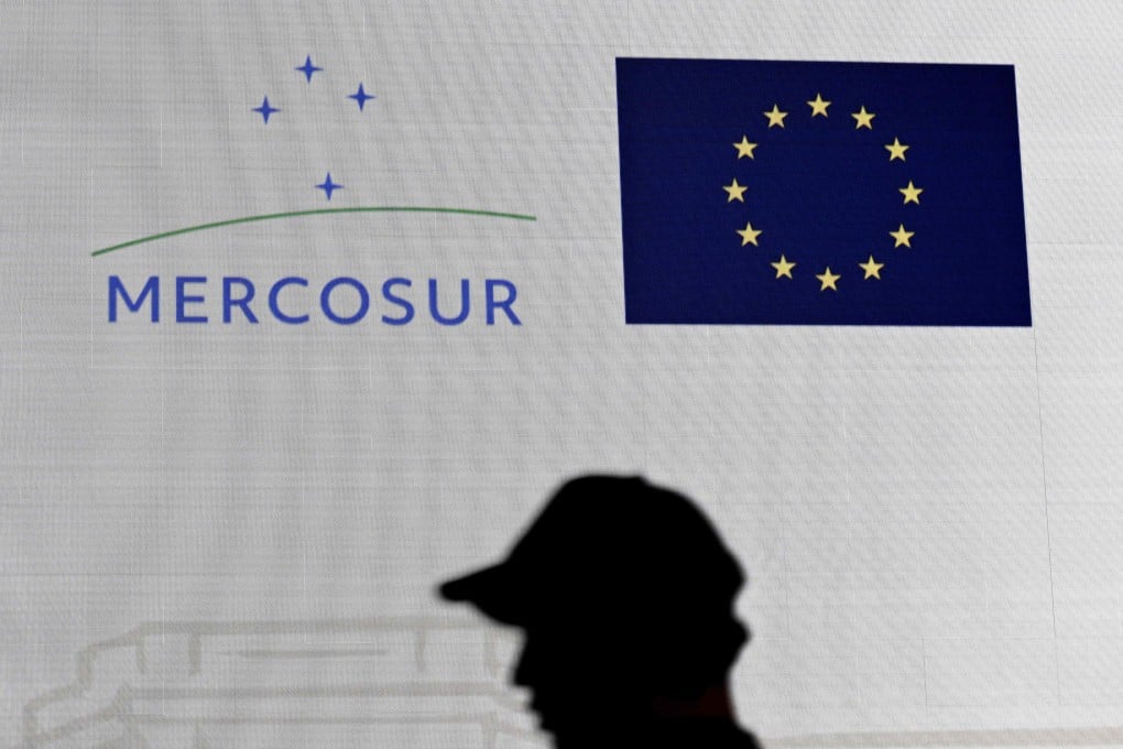 A worker sets up the stage for the signing ceremony of the agreement between the European Union and Mercosur in Paraguay’s central bank in Asuncion on Friday. Photo: AFP