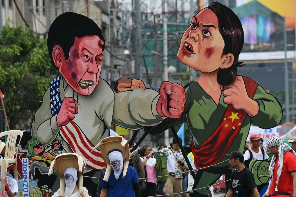 Effigies of Philippine President Ferdinand Marcos Jnr (left) and Vice-President Sara Duterte are seen at a protest march in Manila. Photo: AFP