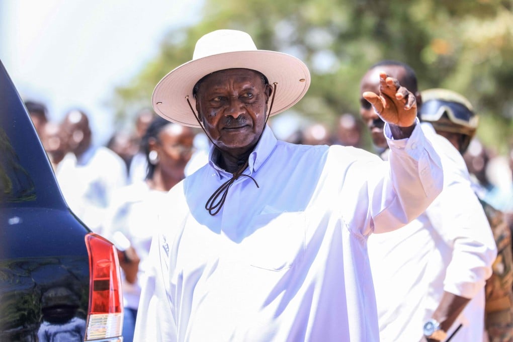 Uganda’s President Yoweri Museveni leaves after casting his ballot in Rwakitura on Thursday. Photo: AFP