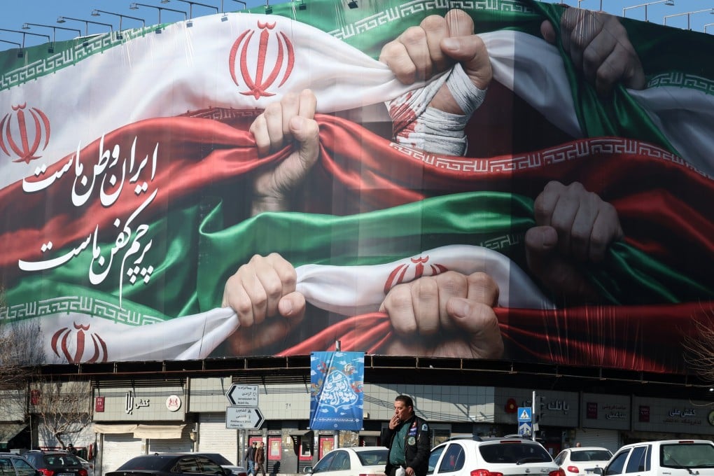 “Iran is our Homeland”, reads a billboard in Persian at a shop in Tehran. Photo: EPA-EFE