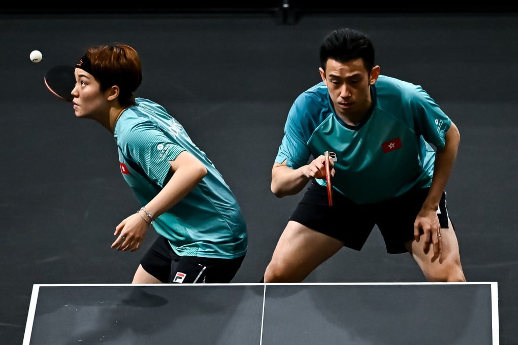 Hong Kong’s Doo Hoi-kem (left) and Wong Chun-ting finally got their hands on a WTT trophy. Photo: Xinhua