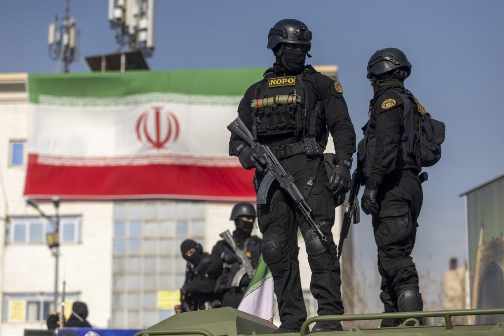 Security forces are seen during a pro-government rally on January 12, in Tehran, Iran. Photo: Getty Images/TNS