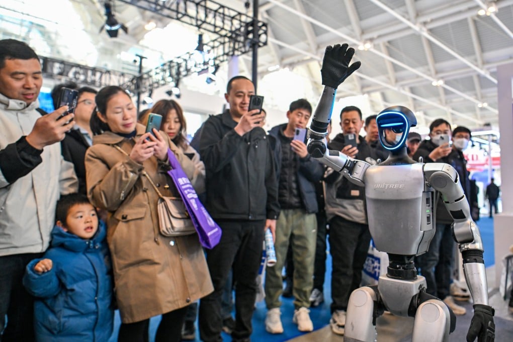 A G1 humanoid robot model from Unitree waves at visitors during the 21st China International Equipment & Manufacturing Industry Expo in Tianjin on March 6, 2025. Photo: Xinhua
