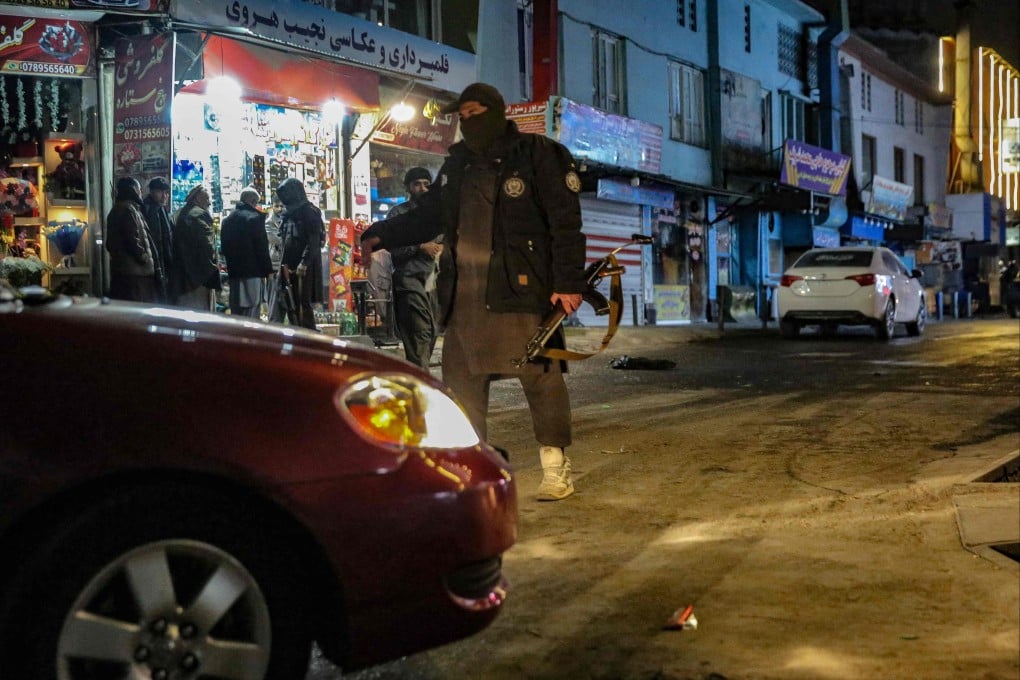 Taliban security personnel at the scene of the blast in Kabul. Photo: AFP