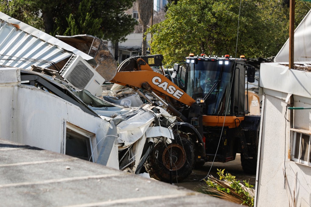 Heavy machinery operates as Israeli forces dismantle UNRWA headquarters in East Jerusalem on Tuesday. Photo: Reuters