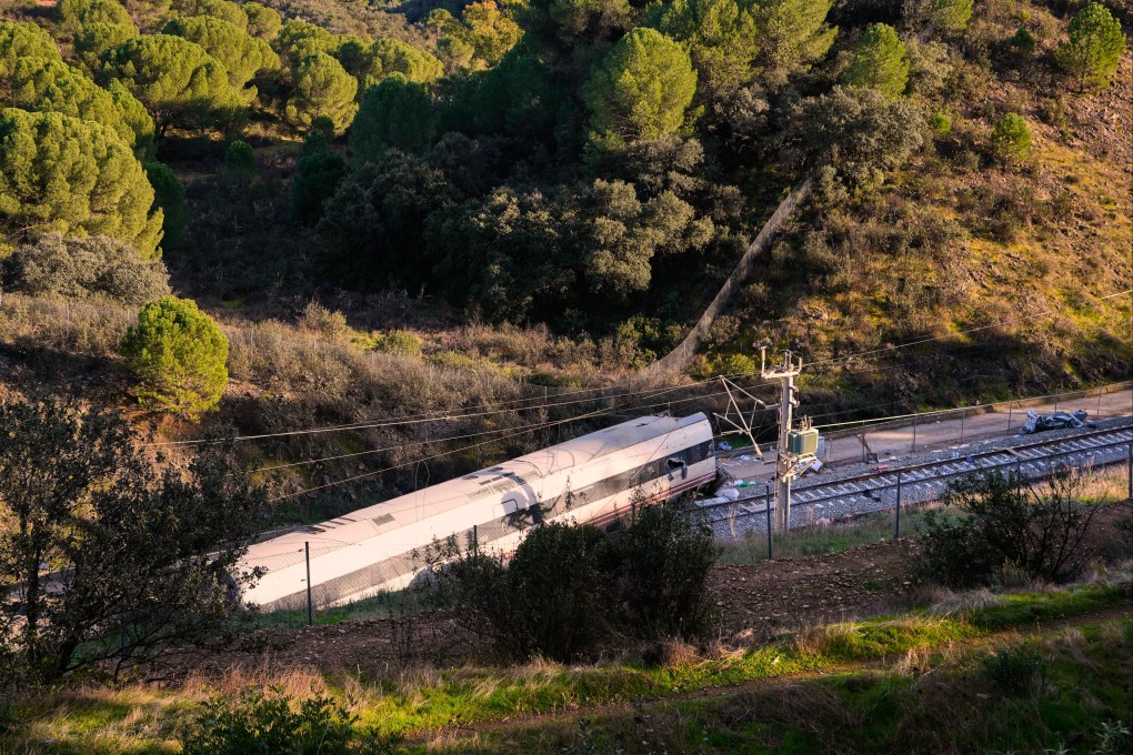 Part of a wrecked train at the site of a collision in Adamuz,, southern Spain on Monday. Photo: AP