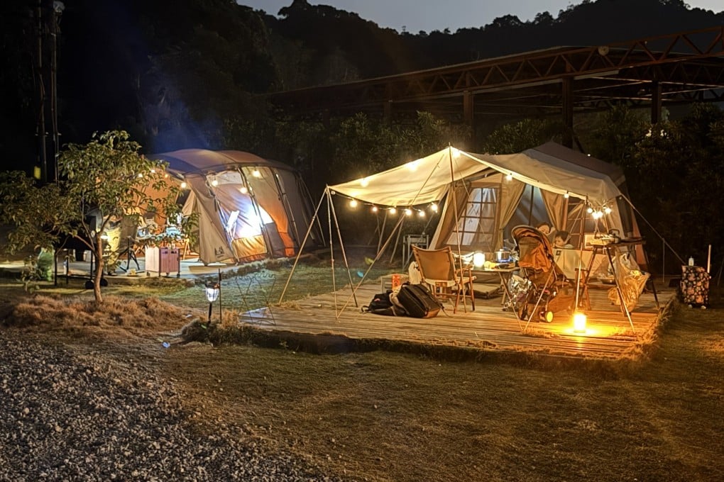 Instagrammable tents are lit up at a glamping site in Shek Chung Au, in Hong Kong’s New Territories. Glamping’s popularity around the world has skyrocketed in recent years and continues to do so as more people seek out convenient “back to nature” experiences. Photo: Sam Evans