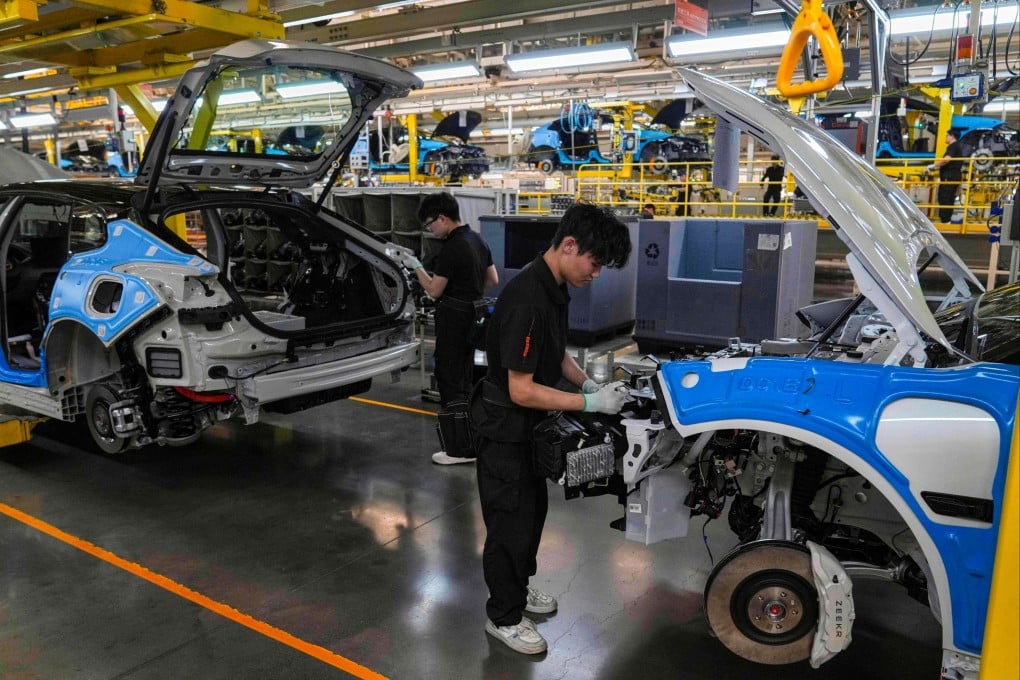 Workers assemble Zeekr models at a plant in Ningbo, Zhejiang province, on April 17, 2025. Photo: AP