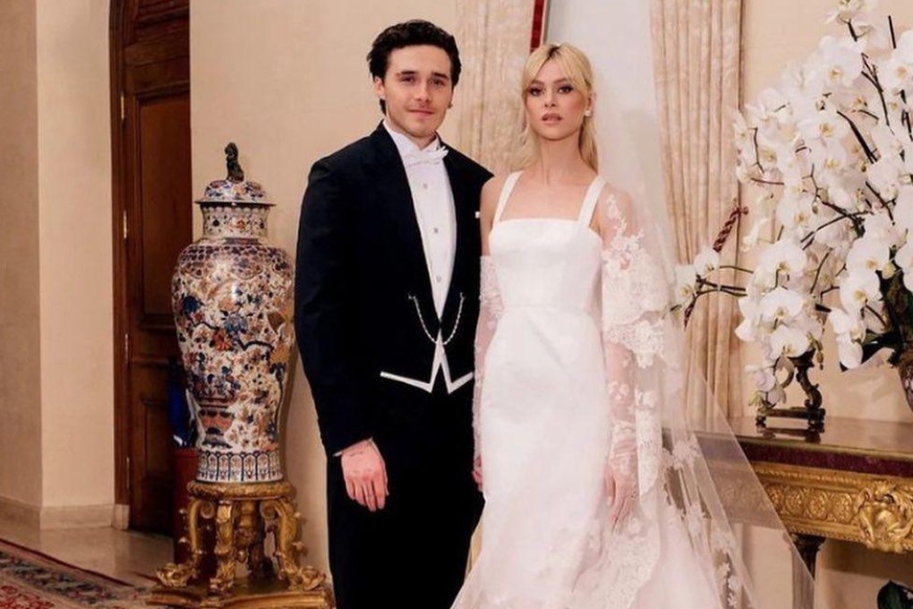 Nicola Peltz Beckham and Brooklyn Peltz Beckham at their wedding in April, 2022. Photo: @kateleemakeup/Instagram