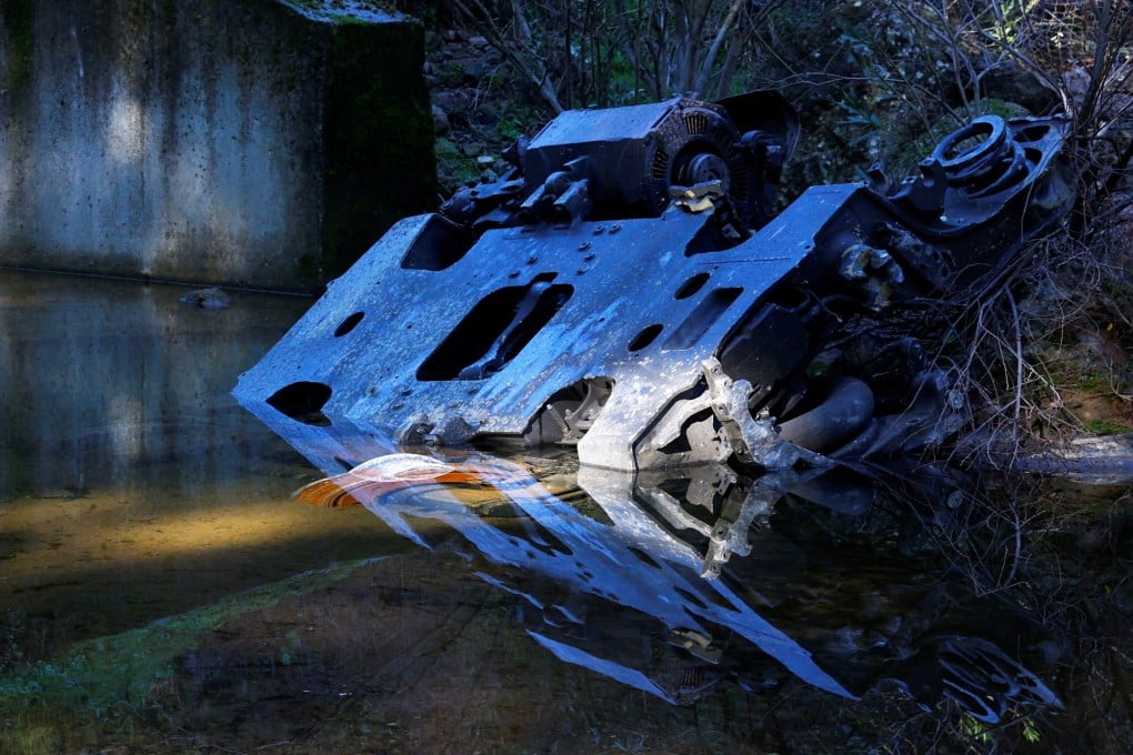 A metal part is seen near the site of a deadly derailment of two high-speed trains in Cordoba, Spain on Tuesday. Photo: Reuters