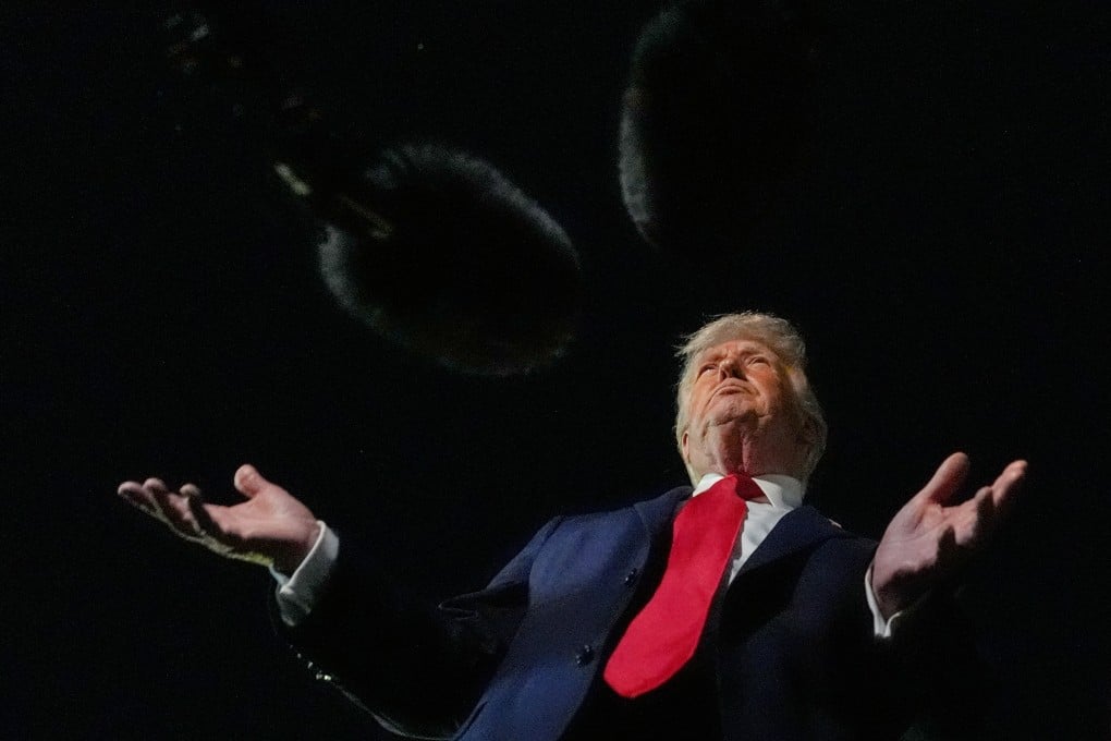US President Donald Trump speaks to reporters before boarding Air Force One at Palm Beach International Airport, in West Palm Beach, Florida, on January 19. Photo: AP