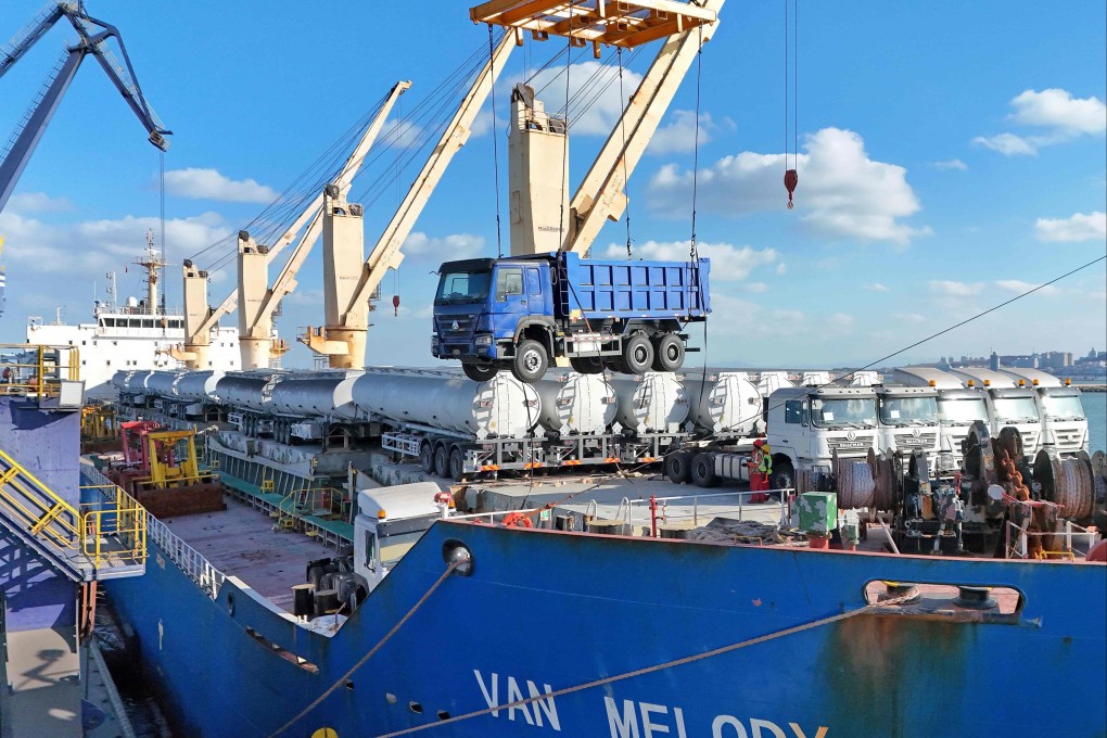 Workers load trucks for export to Africa at Yantai port in Shandong province this month. The jump in Africa’s trade deficit with China was driven by a 25.8 per cent surge in Chinese exports, outpacing 5.4 per cent growth in African shipments to China. Photo: AFP