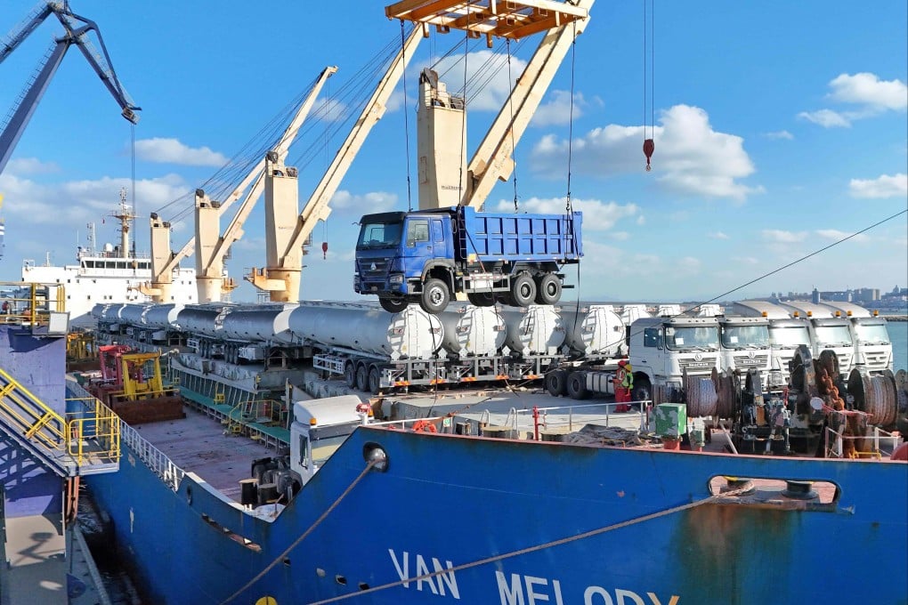 Workers load trucks for export to Africa at Yantai port in Shandong province this month. The jump in Africa’s trade deficit with China was driven by a 25.8 per cent surge in Chinese exports, outpacing 5.4 per cent growth in African shipments to China. Photo: AFP