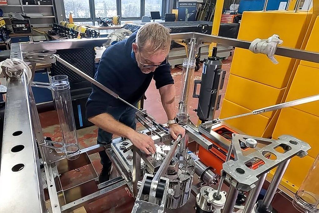 Andrew Sweetman is seen in an undated image working with one of the new landers in Oban, Scotland. Photo: Scottish Association for Marine Science of AFP