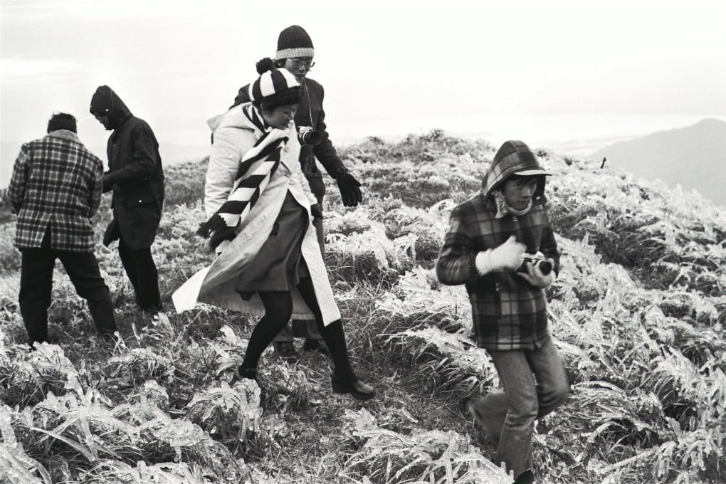 Visitors bundled up against the cold to see the frost on Tai Mo Shan, where the temperature fell to minus three degrees Celsius in December 1975. Photo: SCMP Archives