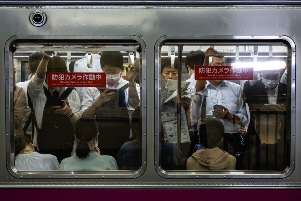 Commuters travel on a train in Tokyo. Experts say the 15.1 per cent figure for male victims of groping – as revealed in a recent survey – is particularly striking. Photo: AFP