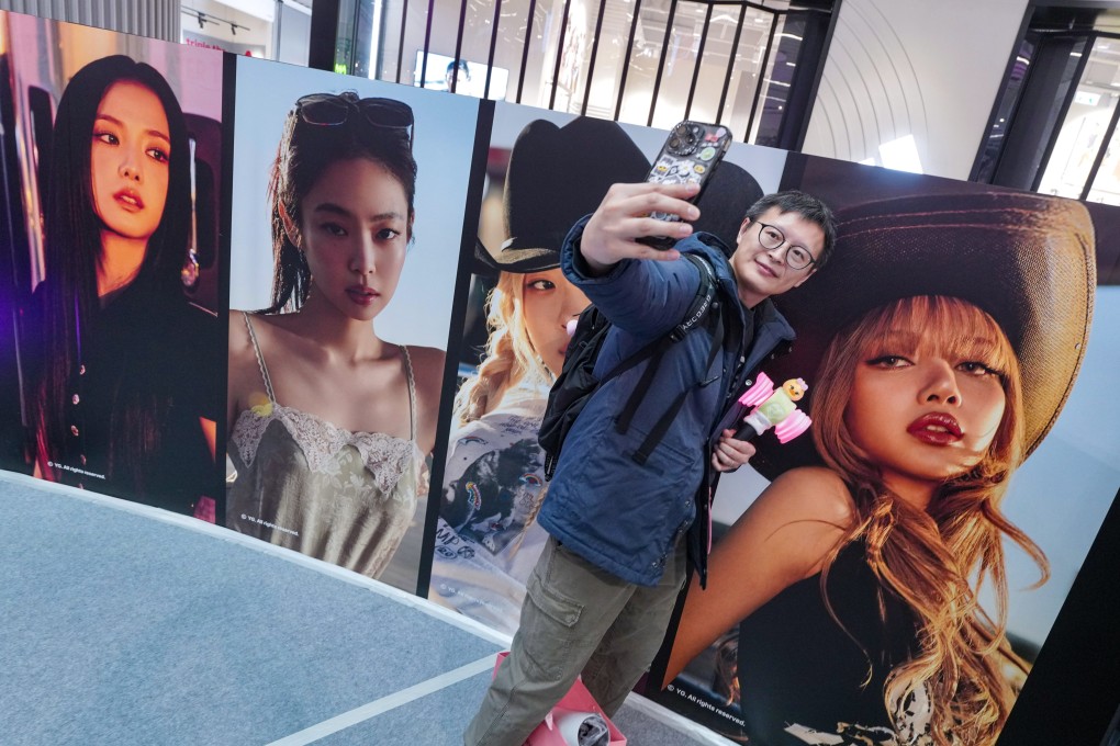 A Blackpink fan takes a selfie at a pop-up store in Kai Tak Mall 2. Photo:  Karma Lo