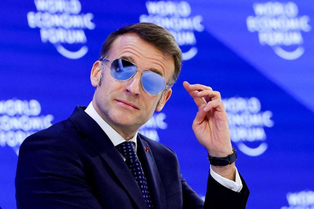 France’s President Emmanuel Macron wears sunglasses as he attends the World Economic Forum meeting in Davos, Switzerland, on Tuesday. Photo: Reuters