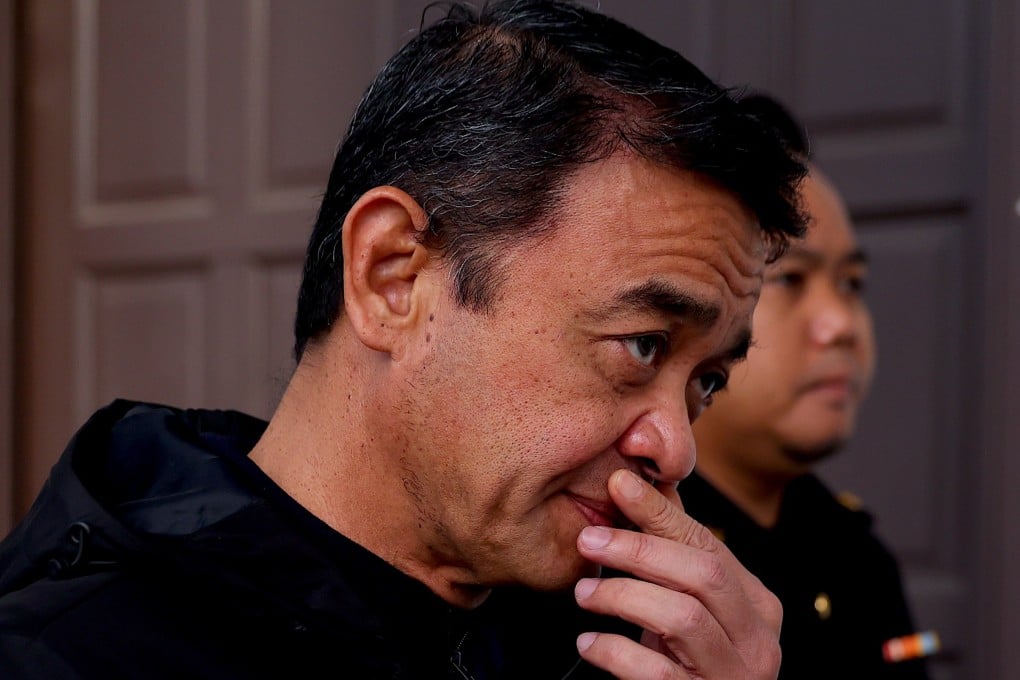 Former Malaysian army chief Muhammad Hafizuddeain Jantan is escorted to court on Thursday. Photo: EPA