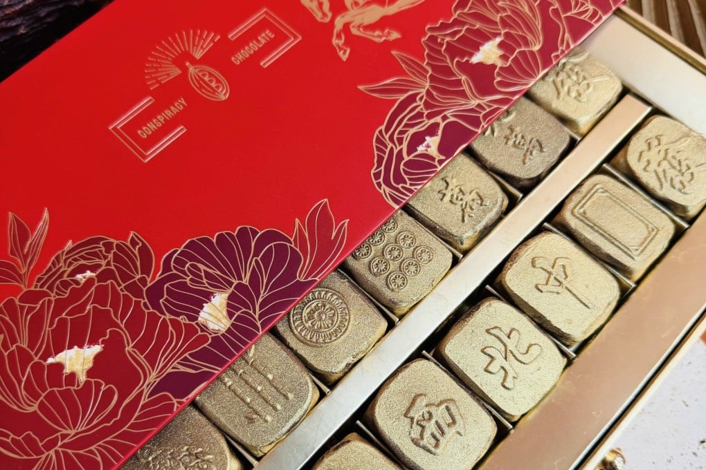 A box of Conspiracy Chocolate’s latest Lunar New Year collection showcases “mahjong tiles” displayed in a winning “13 Orphans” hand. The chocolate set has sparked a cultural appropriation debate over its unlucky symbolism. Photo: Conspiracy Chocolate