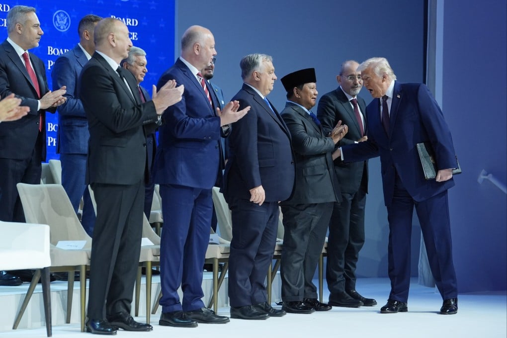 US President Donald Trump (right) greets leaders as he arrives for a Board of Peace charter announcement at the annual meeting of the World Economic Forum in Davos, Switzerland, on January 22. Photo: AP