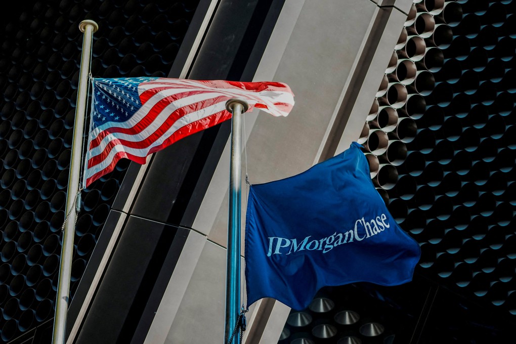 The US flag and a flag with the logo of JPMorgan Chase are flown at the firm’s new headquarters in New York in October 2025. Photo: Reuters