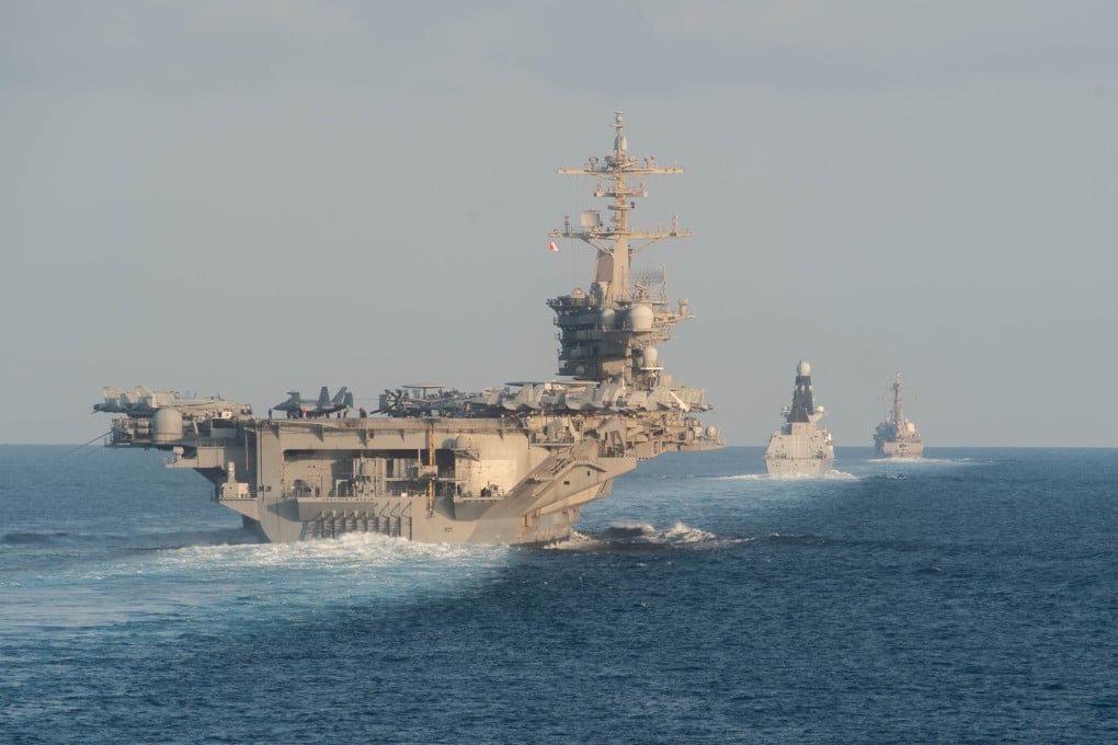 The USS Abraham Lincoln and other warships transit the Strait of Hormuz in 2019. Photo: US Navy via AFP