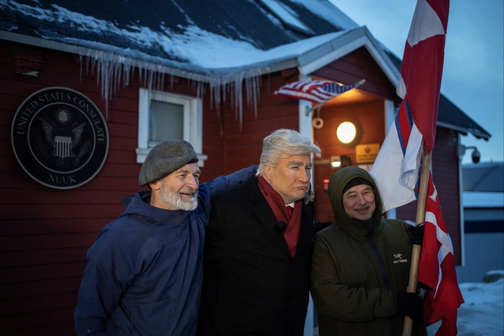Canadian comedian Mark Critch wears a Donald Trump costume and poses with locals in front of the US consulate in Nuuk, Greenland, on Thursday. Photo: Reuters