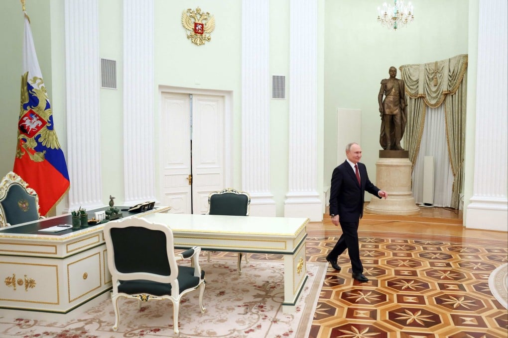 Russia’s President Vladimir Putin arrives for a meeting with Donald Trump’s envoys. Photo: Kremlin via AFP