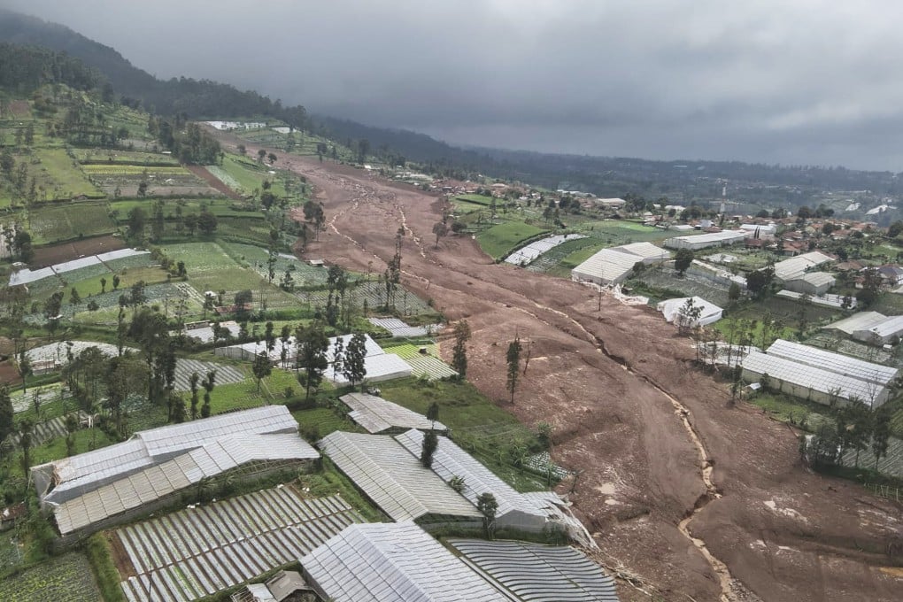 A drone shot on Saturday shows an area affected by fatal landslides in a village in West Java. Photo: Indonesian National Search and Rescue Agency via AP