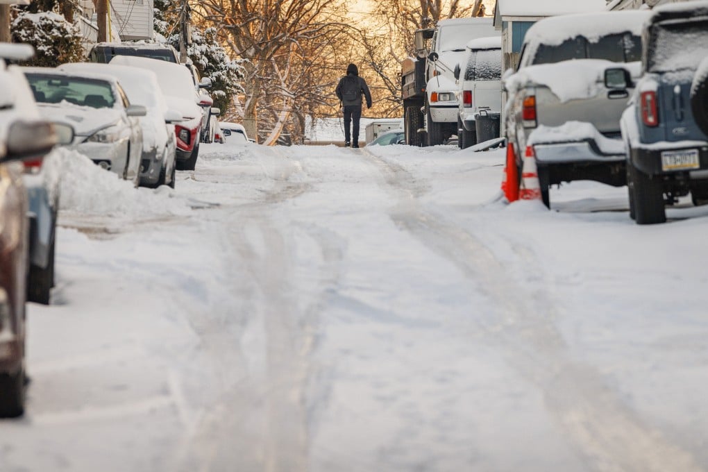 A pedestrian walks on snow and ice in Philadelphia on Monday, with more snow expected this weekend. Photo: via TNS