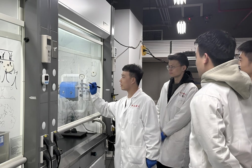Materials scientist and study lead author Zhang Shuchen (left) pictured in a lab at the University of Science and Technology of China. Photo: Xinhua