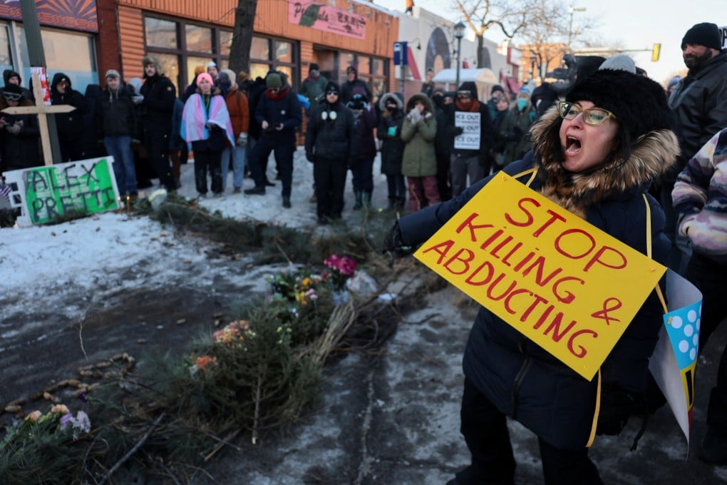 People gather around a makeshift memorial at the site where a man was shot dead by federal agents trying to detain him in Minneapolis, Minnesota, on Saturday. Photo: Reuters