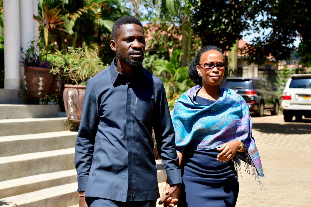 Robert Kyagulanyi, also known as Bobi Wine, walks with his wife Barbara near Kampala, Uganda, on the day of the general election earlier this month. Photo: Reuters