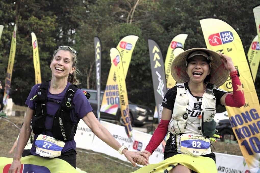Slovakian Veronika Leng (left) and Vietnam’s Hau Ha won Saturday’s Anta Guanjun Hong Kong 100 race while holding hands. Photo: Handout