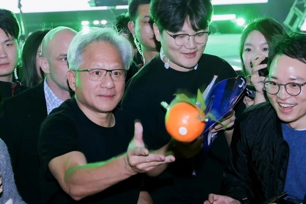 Jensen Huang hands out tangerines at Nvidia’s annual Lunar New Year celebration in Shanghai on January 24, 2026. Photo: Handout