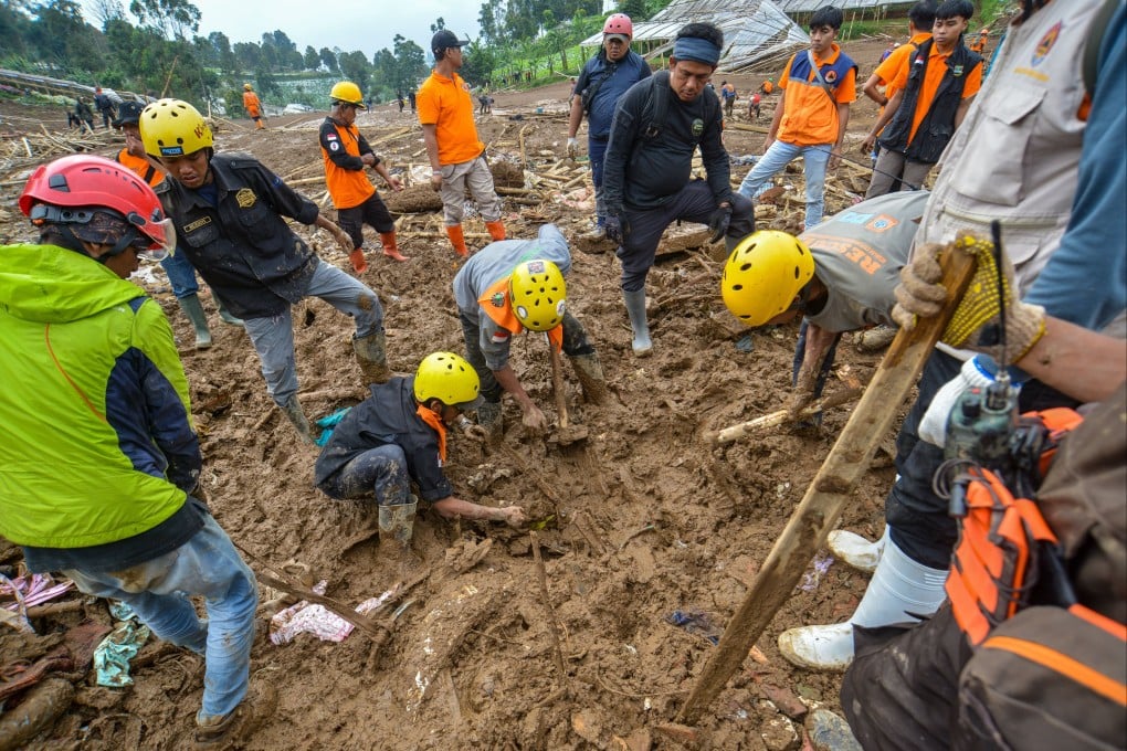 Rescuers search for victims in a landslide-affected area in Pasirlangu village, West Bandung, West Java Province, Indonesia, on Sunday. Photo: EPA-EFE
